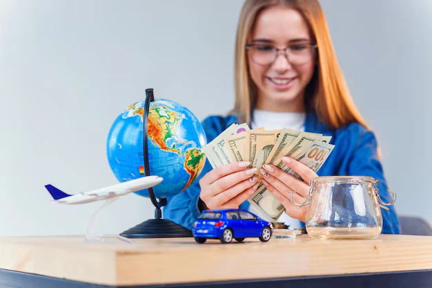 Best Travel Insurance for Student Educational Trips: What You Need to Know 1 beautiful caucasian woman denim shirt counts money future trip around world feels happiness 141188 2308